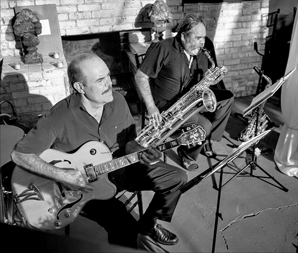 Image of David Harrison and Phillip Orozco playing music