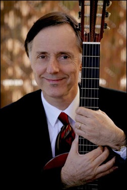 Image of Julian Catford with guitar